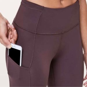 Fast and free leggings. Side pocket, dark purple, reflective dots on ankle